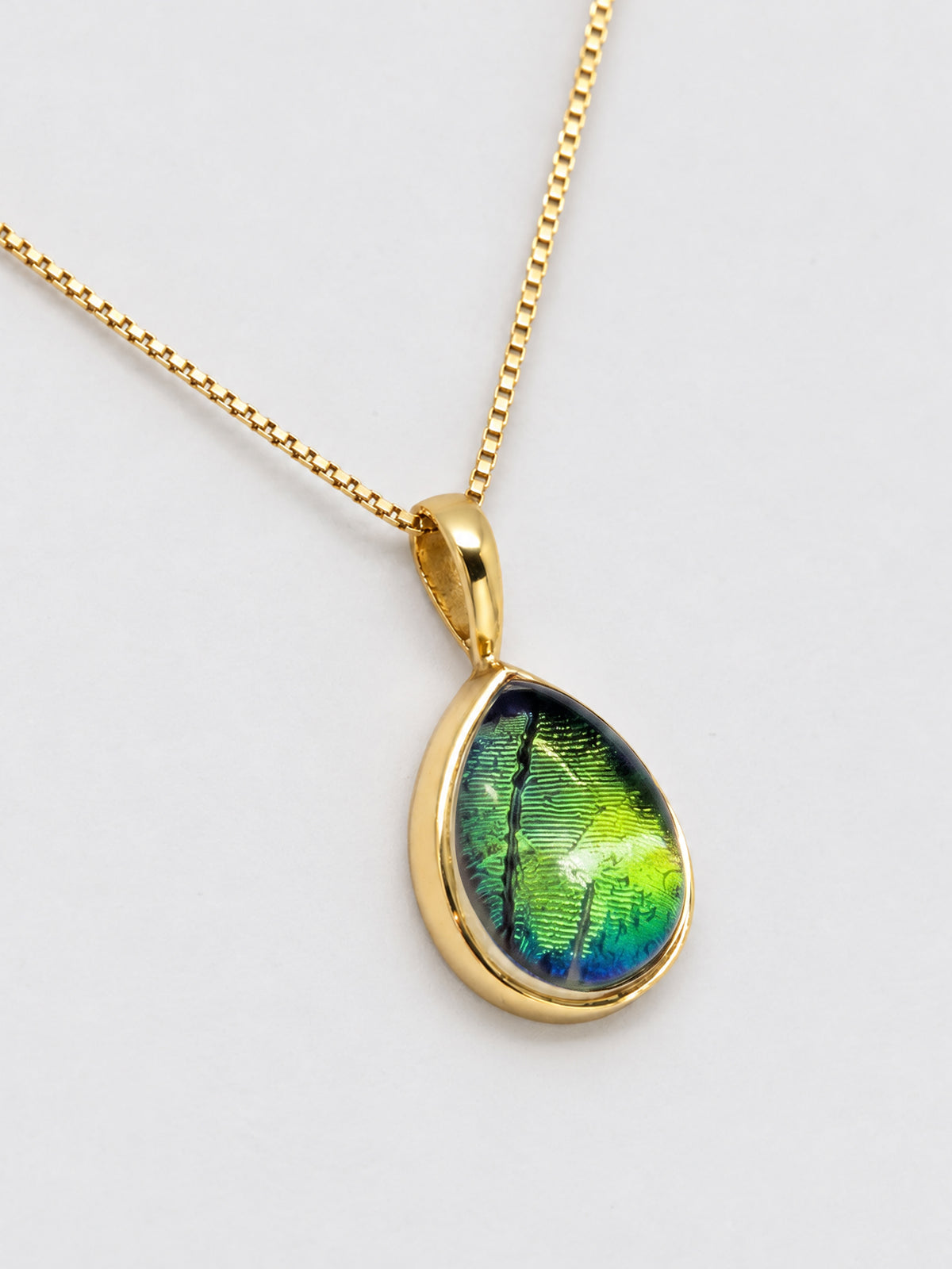 Iridescent Green Cabochon Charm – Gold Plated